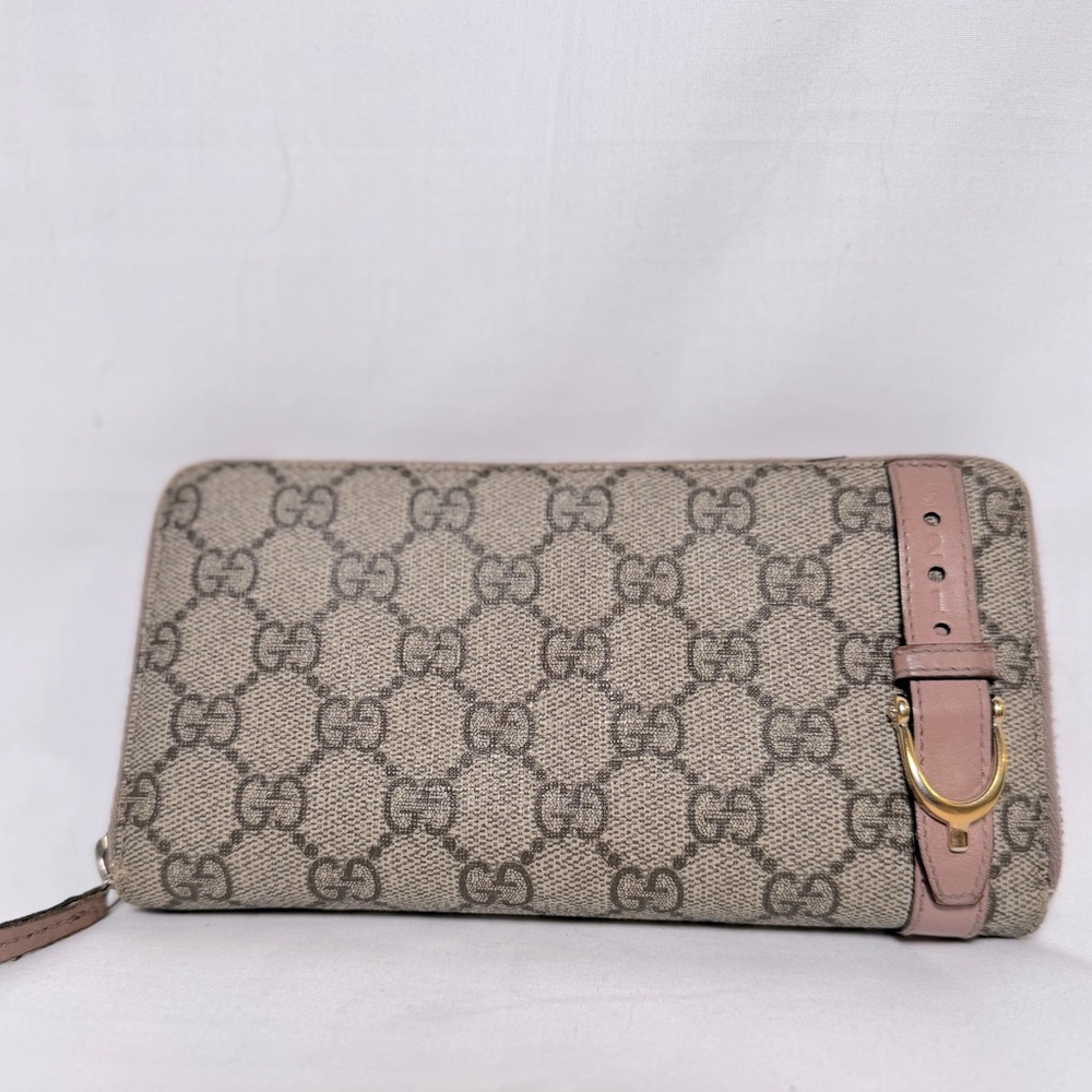 SOLD Gucci Pink Zippy Wallet